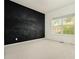 Bedroom with a chalkboard wall and natural light from the window at 5870 Buckner Creek Dr, Mableton, GA 30126