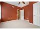 This bedroom features cozy carpeting, neutral wall color, and a ceiling fan for added comfort at 5870 Buckner Creek Dr, Mableton, GA 30126