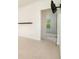 Open living space with minimalist decor and views into an adjacent room at 5870 Buckner Creek Dr, Mableton, GA 30126