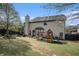 Spacious backyard with a patio, play area, and well-maintained lawn, perfect for outdoor enjoyment at 812 Nevis Way, Mcdonough, GA 30253