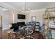 Spacious office with a glass desk, multiple monitors, and ample shelving for books at 812 Nevis Way, Mcdonough, GA 30253