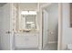 Bright bathroom showcasing vanity with granite countertops and modern sink at 2507 Fairweather Se Ct, Conyers, GA 30013