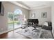 Bright home office with large window, modern desk setup, and neutral decor at 2507 Fairweather Se Ct, Conyers, GA 30013