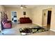 Open living room with unique Hulk themed accents and comfortable seating at 2507 Fairweather Se Ct, Conyers, GA 30013
