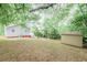 View of backyard with shed and fire pit at 75 Meldon Se Ave, Atlanta, GA 30315