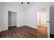 Comfortable bedroom with wood-look floors and easy access to a full bathroom at 75 Meldon Se Ave, Atlanta, GA 30315