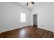 Inviting bedroom with ceiling fan, durable floors, closet, and neutral color palette at 75 Meldon Se Ave, Atlanta, GA 30315