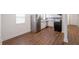 Modern kitchen featuring stainless steel appliances, white cabinets, and sleek countertops at 75 Meldon Se Ave, Atlanta, GA 30315