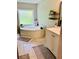 Bathroom featuring a soaking tub, vanity, and decorative shelving at 8 Dixie Dr, Stockbridge, GA 30281