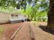 Charming home with a well-kept yard and inviting front porch, perfect for enjoying the outdoors at 8 Dixie Dr, Stockbridge, GA 30281