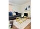 Cozy living room showcasing comfortable seating, an electric fireplace, and an area rug at 8 Dixie Dr, Stockbridge, GA 30281