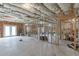 Unfinished basement shows framing, insulation, and a blank canvas for future renovations at 1625 Brisbane Dr, Dacula, GA 30019