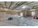 Unfinished basement with exposed insulation and wood framing awaiting customization and personalization at 1625 Brisbane Dr, Dacula, GA 30019