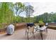 Outdoor deck perfect for dining, grilling, and enjoying the serene views of the surrounding trees at 1625 Brisbane Dr, Dacula, GA 30019