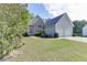 Attractive house with a two-car garage, neat landscaping, and a welcoming entryway at 1625 Brisbane Dr, Dacula, GA 30019
