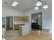 Bright kitchen with modern appliances, light-colored cabinets, and a dining area at 1625 Brisbane Dr, Dacula, GA 30019