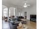 Inviting living room featuring a ceiling fan, hardwood floors, and an open layout at 1625 Brisbane Dr, Dacula, GA 30019
