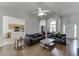 Open living space with a view of the kitchen, dining area, and a welcoming entryway with hardwood floors at 1625 Brisbane Dr, Dacula, GA 30019