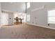 Open concept living area showcasing a living room and kitchen, great for entertaining at 1650 Berryhill Rd, Cumming, GA 30041
