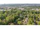 Aerial view showcasing the neighborhood's lush greenery and proximity to the city skyline at 1866 Wildwood Ne Pl, Atlanta, GA 30324