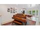 Bonus room with a piano, desk, and tile floor at 1866 Wildwood Ne Pl, Atlanta, GA 30324