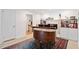Bonus room with a piano, tile floor, and built-in bookshelves at 1866 Wildwood Ne Pl, Atlanta, GA 30324