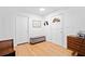 Bright foyer with hardwood floors, a front door with a decorative window, and white walls at 1866 Wildwood Ne Pl, Atlanta, GA 30324