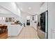 Bright eat-in kitchen with white cabinets, stainless steel appliances, and a tile floor at 1866 Wildwood Ne Pl, Atlanta, GA 30324