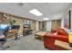 Finished basement with a recreational area including a TV and work area at 2994 Cathy Ann Nw Ct, Acworth, GA 30101