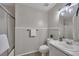 Well-lit bathroom featuring a shower, tub and modern fixtures at 2994 Cathy Ann Nw Ct, Acworth, GA 30101