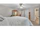 Comfortable bedroom with a queen bed, a mirror, and neutral walls at 2994 Cathy Ann Nw Ct, Acworth, GA 30101