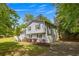 Two-story home with attached garage and long driveway offering ample parking at 2994 Cathy Ann Nw Ct, Acworth, GA 30101