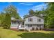 Charming two-story home with gray siding, black shutters, and a well-manicured front yard at 2994 Cathy Ann Nw Ct, Acworth, GA 30101
