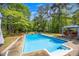 Refreshing backyard pool provides a fun and relaxing outdoor oasis at 2994 Cathy Ann Nw Ct, Acworth, GA 30101
