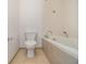 Bathroom with tiled bathtub and tile flooring at 57 Forsyth Nw St # 12E, Atlanta, GA 30303