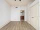 Bedroom has hardwood floors, neutral paint, and a double door closet at 57 Forsyth Nw St # 12E, Atlanta, GA 30303