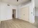 Bright bedroom features ample closet space, neutral walls, and light wood floors at 57 Forsyth Nw St # 12E, Atlanta, GA 30303