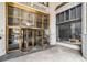 The Healey Building entrance showcases revolving doors and detailed architectural elements at 57 Forsyth Nw St # 12E, Atlanta, GA 30303