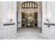 The Healey Building entrance features revolving doors and detailed architectural elements at 57 Forsyth Nw St # 12E, Atlanta, GA 30303