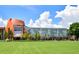Showcasing a landmark building with a large lawn and clear blue skies; featuring a unique architectural design and inviting grounds at 57 Forsyth Nw St # 12E, Atlanta, GA 30303