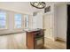 Modern kitchen area with a sleek island, great views, and plenty of natural light at 57 Forsyth Nw St # 12E, Atlanta, GA 30303