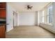 Bright living room featuring hardwood floors, large windows, and classic molding at 57 Forsyth Nw St # 12E, Atlanta, GA 30303