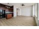 Open-concept kitchen and living area with an island and stainless steel appliances at 57 Forsyth Nw St # 12E, Atlanta, GA 30303