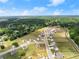 An aerial view displays the community's landscaping and neighborhood layout at 837 Porches Way, Dacula, GA 30019
