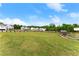 Expansive backyard featuring lush lawn and wooded fence, providing an ideal space for outdoor activities at 837 Porches Way, Dacula, GA 30019