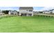 Expansive backyard featuring a well-maintained lawn at 837 Porches Way, Dacula, GA 30019