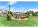 A backyard area is shown with a central fire pit at 837 Porches Way, Dacula, GA 30019