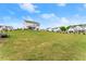 Expansive backyard featuring lush lawn, providing an ideal space for outdoor activities at 837 Porches Way, Dacula, GA 30019