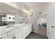 Bright bathroom features double marble vanity and stylish fixtures at 837 Porches Way, Dacula, GA 30019
