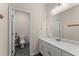 Clean bathroom with white cabinets, modern fixtures, and tile flooring, offering a comfortable space at 837 Porches Way, Dacula, GA 30019